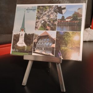 Collage mit Aufnahmen der Gemeinde Aarwangen von fotohaefeli 4912 Aarwangen. Kirche, Tierlihus, Schloss mit Aarebrücke und Bären, Luftaufnahme des Dorfkerns mit altem Primarschulhaus.