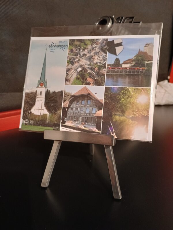 Collage mit Aufnahmen der Gemeinde Aarwangen von fotohaefeli 4912 Aarwangen. Kirche, Tierlihus, Schloss mit Aarebrücke und Bären, Luftaufnahme des Dorfkerns mit altem Primarschulhaus.